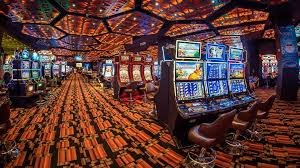 Starburst slot game interface on markastoto slot platform showing five reels and gem symbols